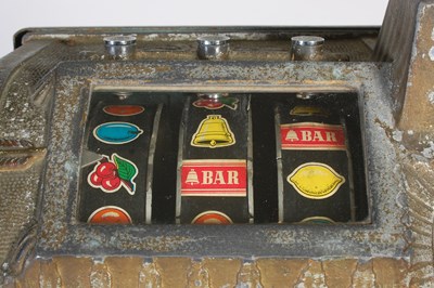 Lot 184 - A vintage American One-Arm Bandit slot machine,...