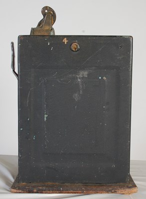 Lot 184 - A vintage American One-Arm Bandit slot machine,...
