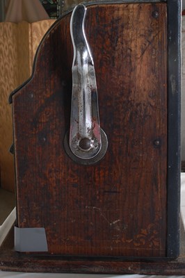 Lot 184 - A vintage American One-Arm Bandit slot machine,...
