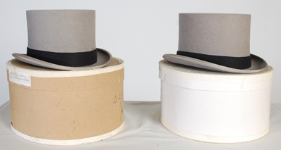 Lot 225 - Two vintage grey coloured top hats, one by...