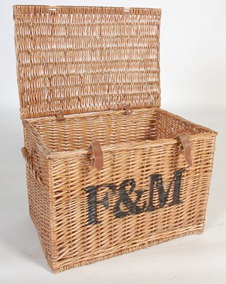 Lot 61 - A Fortnum & Mason wicker twin handled hamper,...