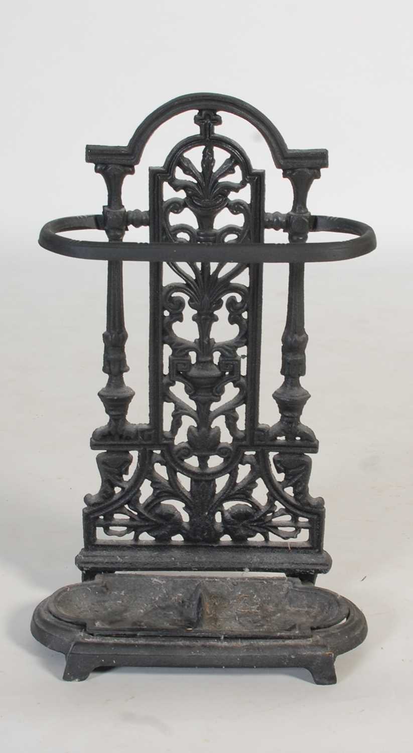 Lot 79 - A small cast iron stick stand, 52.5cm high;...