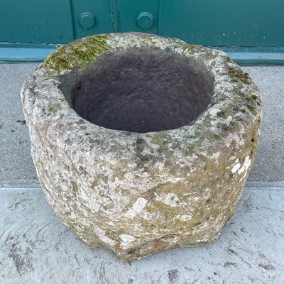 Lot 153 - A circular stone planter, 46cm wide x 28cm...