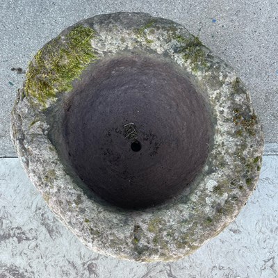 Lot 153 - A circular stone planter, 46cm wide x 28cm...