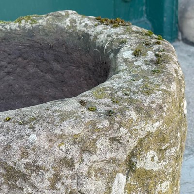 Lot 153 - A circular stone planter, 46cm wide x 28cm...