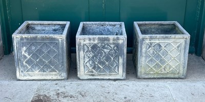 Lot 152 - Three composite square shaped garden...
