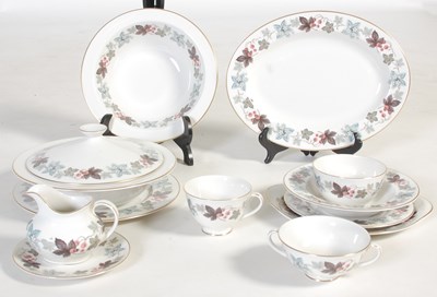 Lot 771 - A Royal Doulton Camelot pattern dinner set.
