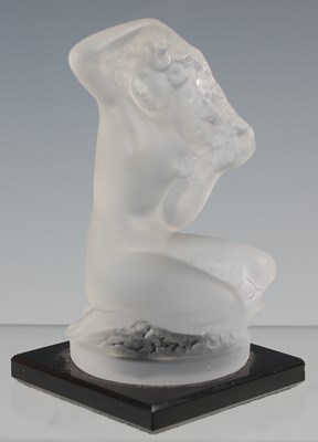 Lot 713 - A Lalique frosted glass figure of a nude...
