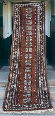 Lot 167 - A Persian long rug, the rectangular earth...