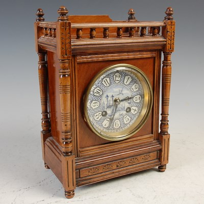 Lot 295 - A late 19th century Aesthetic movement walnut...
