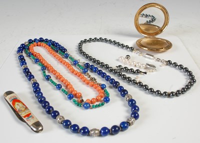 Lot 569 - A collection of assorted necklaces, to include...
