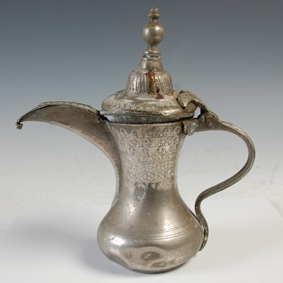 Lot 859 - A Middle Eastern Turkish ‘Dallah’ coffee pot,...