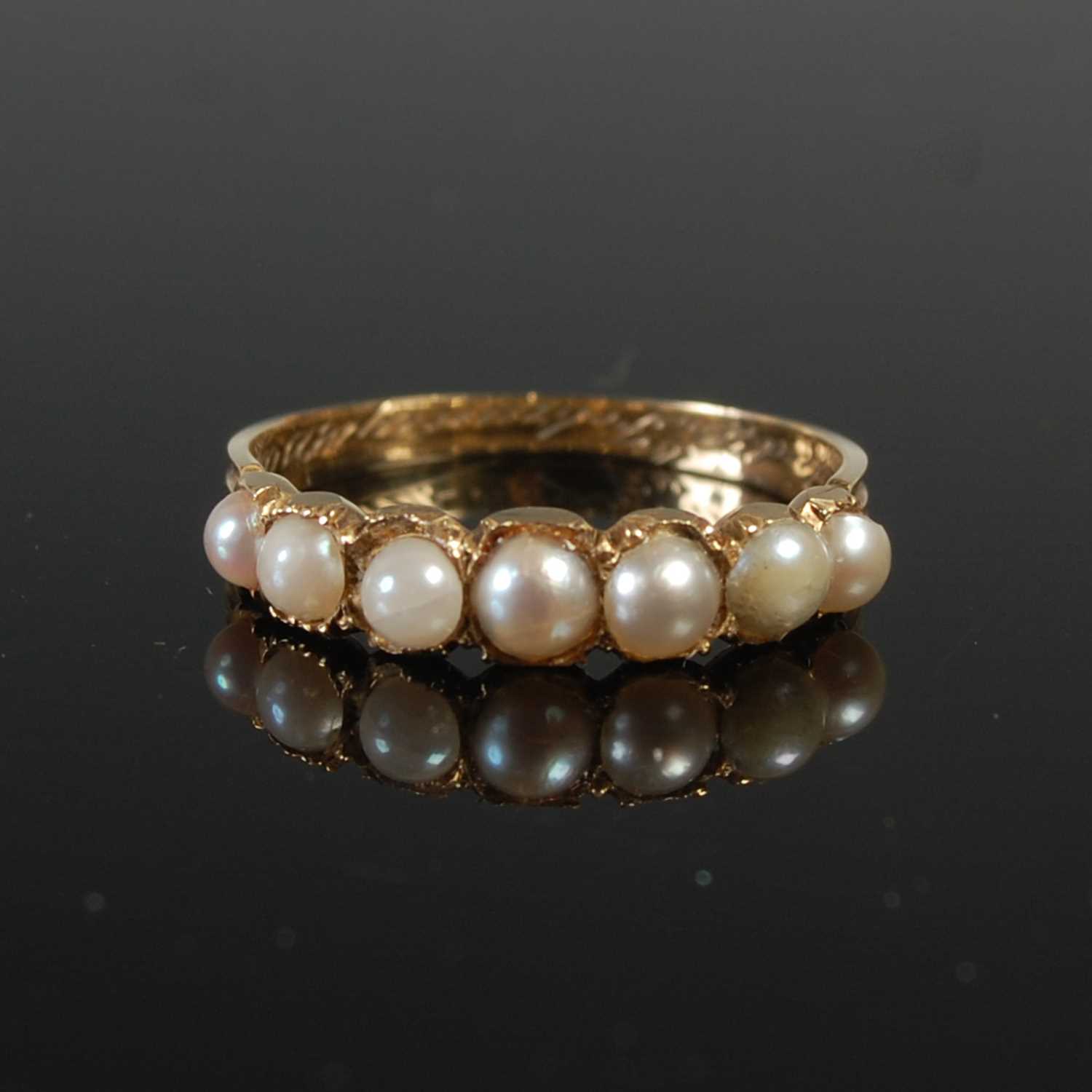Lot 664 - A 19th century mourning ring, set with seven...