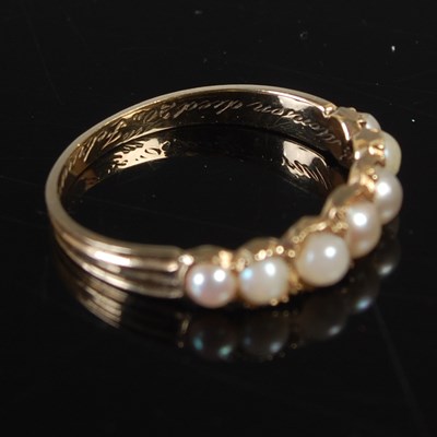 Lot 664 - A 19th century mourning ring, set with seven...