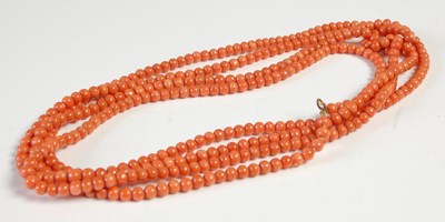 Lot 661 - A late Victorian coral bead long guard...