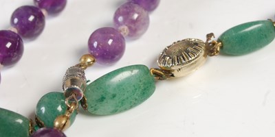 Lot 538 - A green hardstone bead necklace, with...
