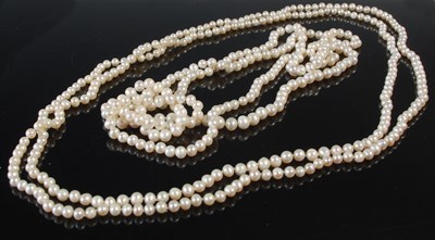 Lot 600 - A cultured pearl long single strand necklace;...