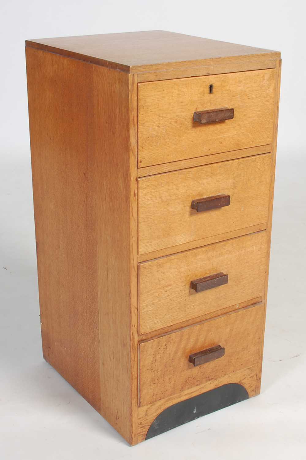Lot 54 - An early 20th century oak chest, of four short...