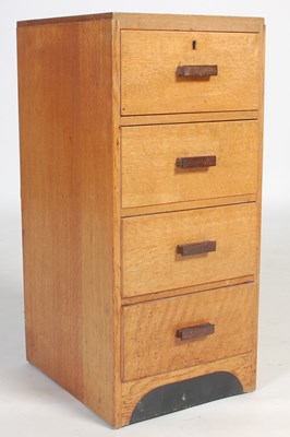 Lot 54 - An early 20th century oak chest, of four short...