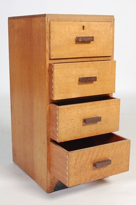 Lot 54 - An early 20th century oak chest, of four short...