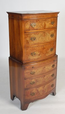 Lot 131 - A 20th century walnut bowfront chest on...