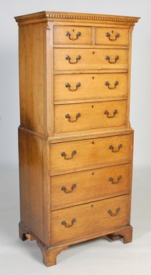Lot 113 - A 20th century oak chest on chest, the...