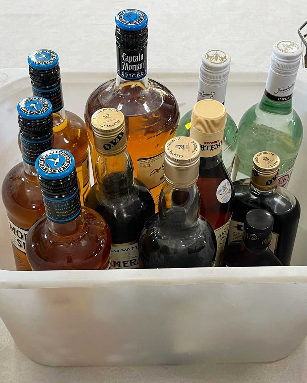 Lot 318 - A box of assorted spirits, to include Bacardi;...