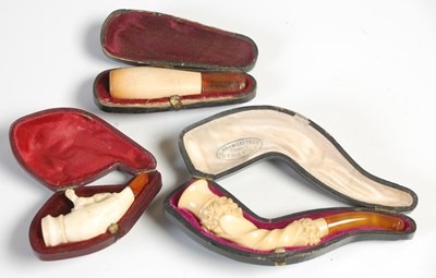 Lot 260 - Three assorted leather cased Meerschaum pipes,...