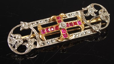 Lot 567 - A yellow and white metal, ruby and diamond set...