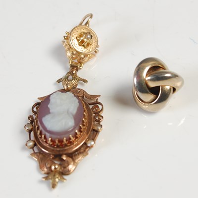 Lot 651 - Two odd yellow metal earrings, one of pendant...
