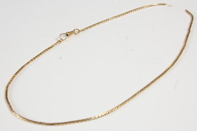 Lot 618 - A yellow metal chain, broken, tests as 18ct...