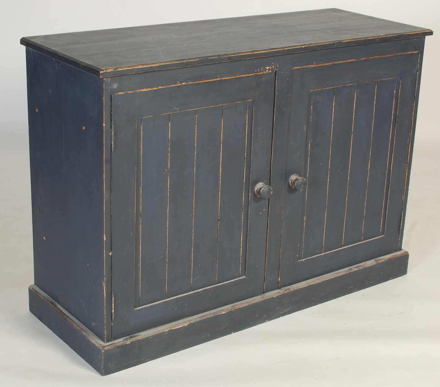 Lot 64 - A blue painted pine side cabinet, the...