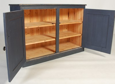 Lot 64 - A blue painted pine side cabinet, the...