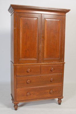 Lot 125 - An oak two part linen press, the upper part...
