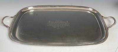 Lot 480 - An Edwardian silver twin handled serving tray,...