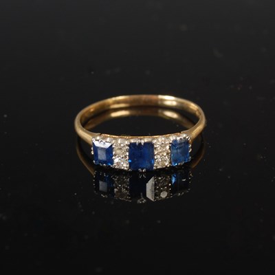 Lot 613A - A yellow metal, sapphire and diamond ring, set...