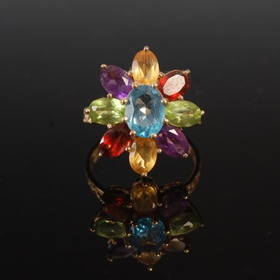 Lot 644E - A yellow metal and coloured gem set flower...