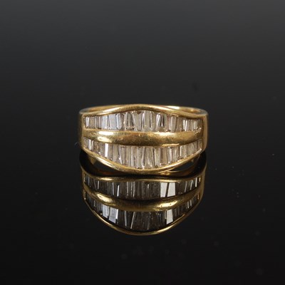 Lot 644G - A yellow metal and diamond set dress ring, set...