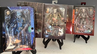 Lot 674 - A collection of boxed Predator figures to...