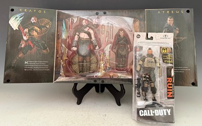 Lot 671 - Four game related figures to include Ruckus...