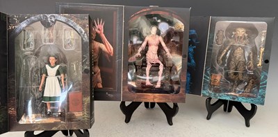 Lot 675 - Three NECA Pans Labyrinth figures to include...