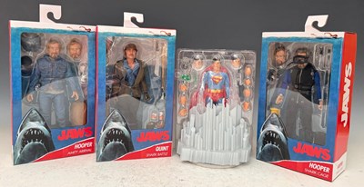 Lot 665 - Three NECA Reel Toys Jaws figures to include...