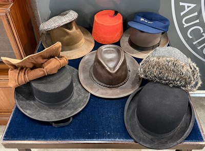 Lot 694 - A collecton of hats, various styles.