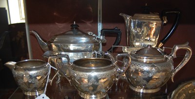 Lot 1 - Four piece electroplated tea set; together...