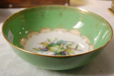 Lot 5 - A Royal Worcester green ground porcelain bowl...