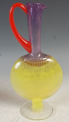 Lot 26 - A Kosta Boda red, purple, yellow and clear...