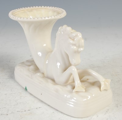 Lot 30 - A Belleek Irish porcelain seahorse spill vase,...