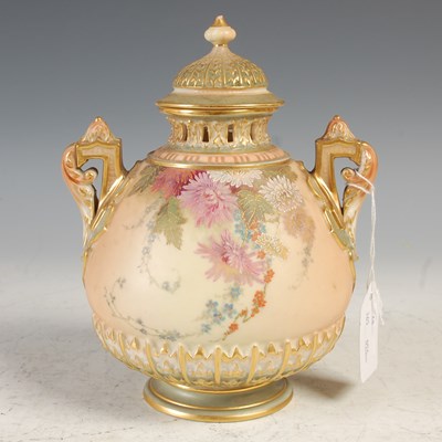 Lot 37 - A Royal Worcester twin handled ivory ground...