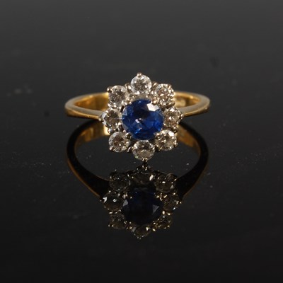 Lot 53 - An 18ct gold, sapphire and diamond cluster...
