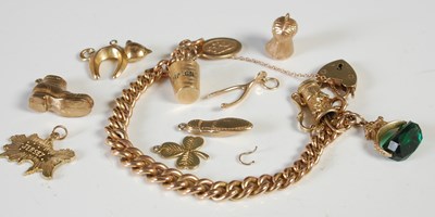Lot 58 - A 9ct gold bracelet with heart shaped lock...